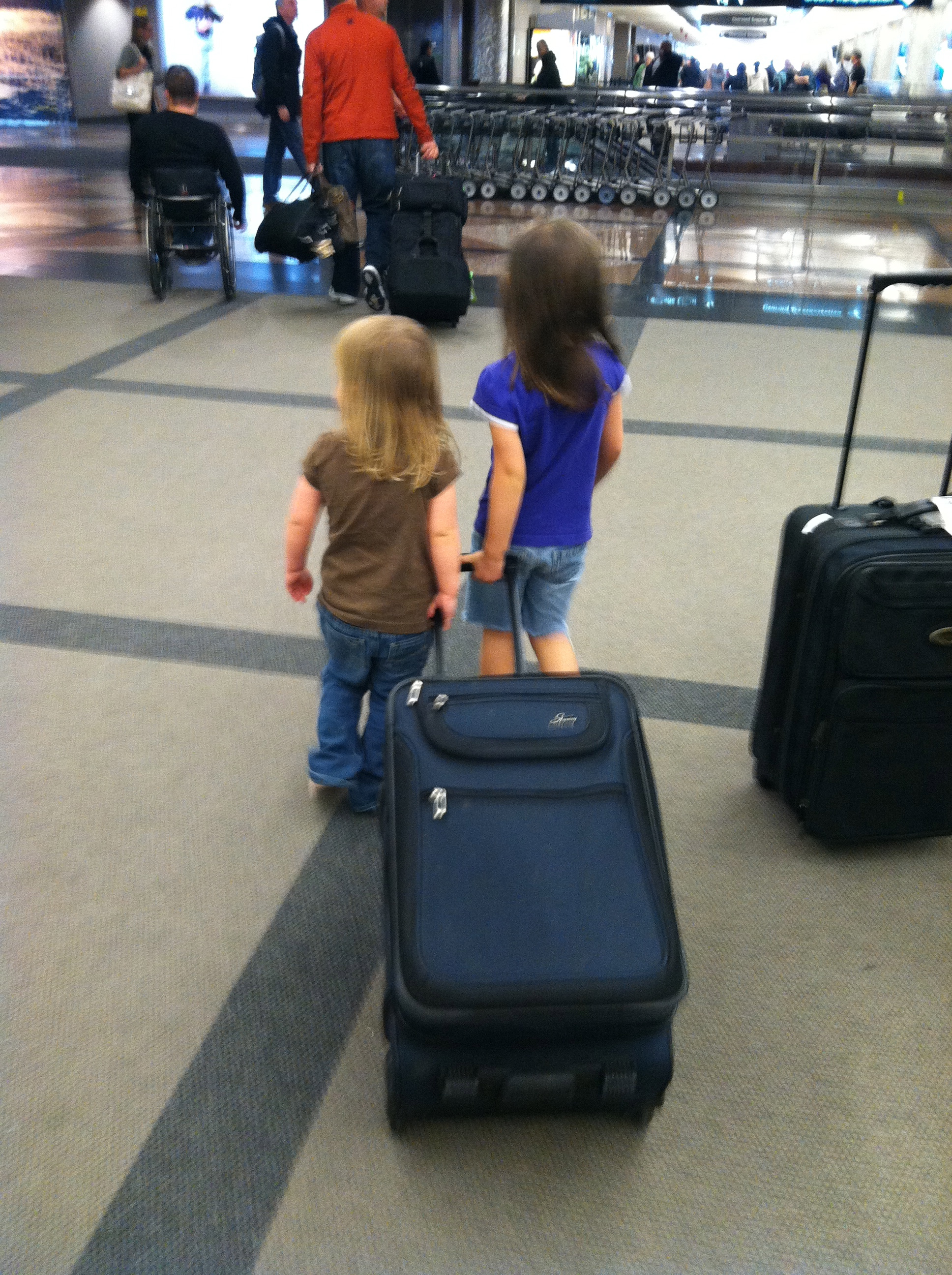 Kids helping at the airport